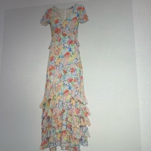 Beautiful multi color dress by Rixo with lovely ruffles& famine sleeves